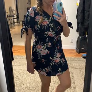 Navy blue floral dress with zipper top & drawstring  waist. Cute ties on arms